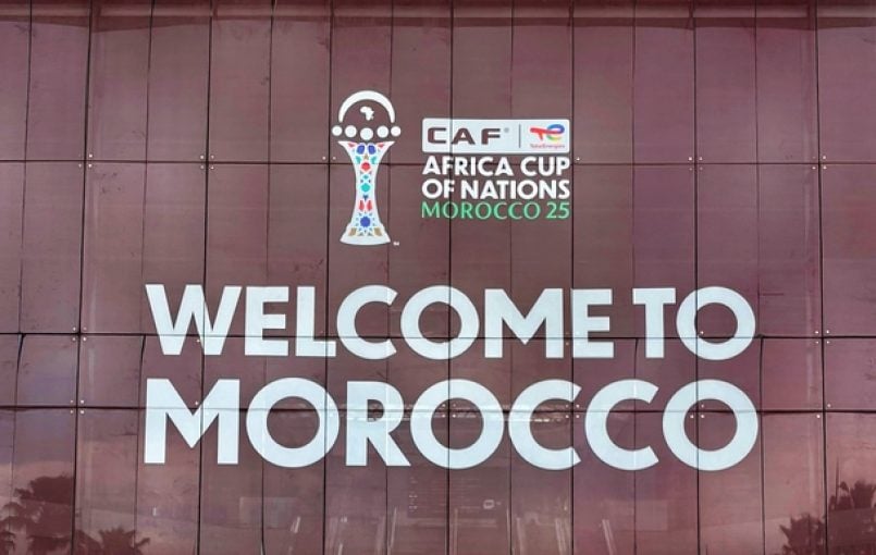Players from Senegal and Morocco shaking hands after a tense football match