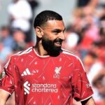 Liverpool secures champions league spot with draw against brentford