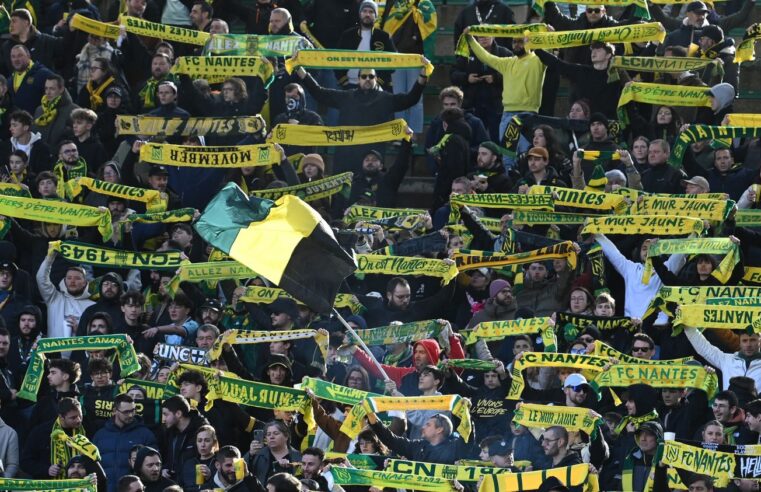 Ligue 1 match interrupted as Nantes fans storm pitch