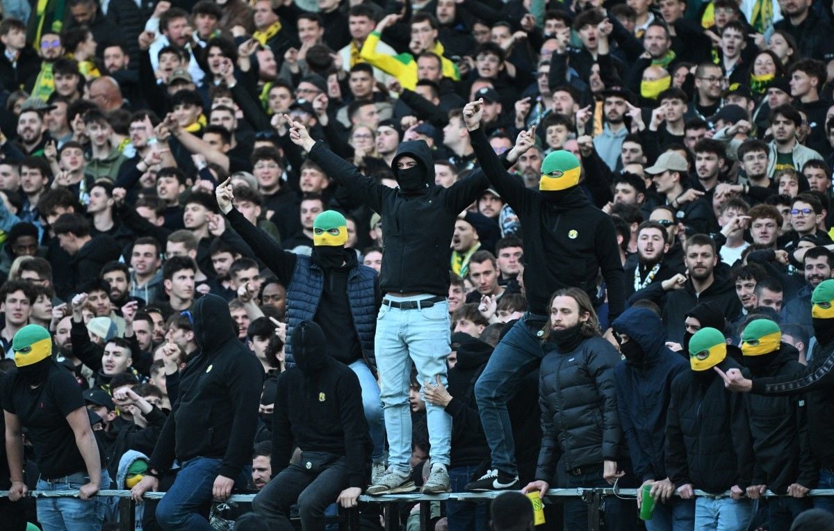 Violent clashes at nantes and nice stadiums as fans storm pitch