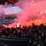 Ligue 1 match interrupted as Nantes fans storm pitch