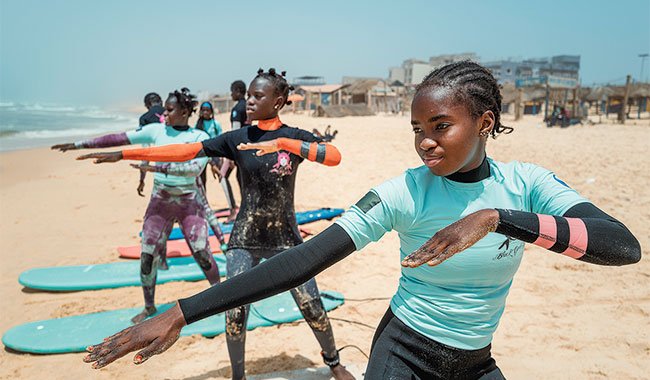 Surfing the waves of change: how a Dakar initiative brings girls back to school
