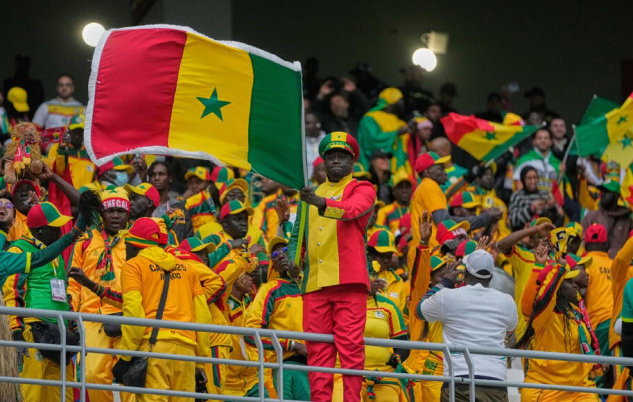 A group of Senegalese supporters celebrating