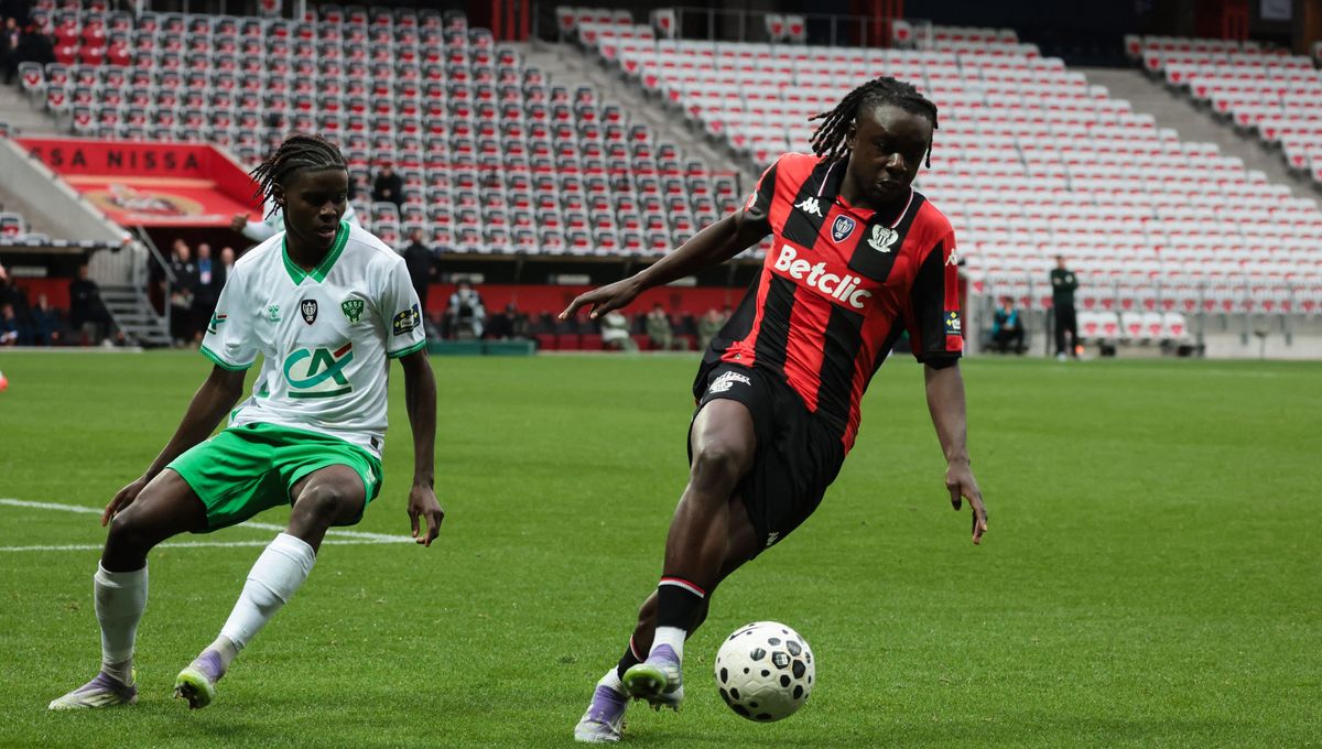 AS Saint-Etienne and OGC Nice players battle in an intense Ligue 1 playoff match