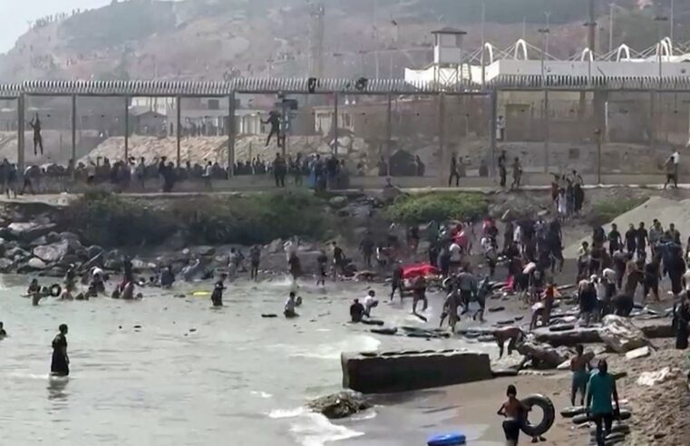 Massive migrant surge at Ceuta raises political tensions between Spain and Morocco