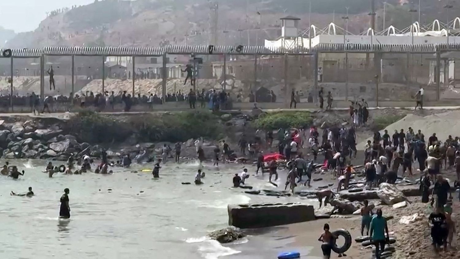 Massive migrant surge at Ceuta raises political tensions between Spain and Morocco