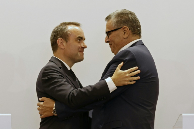French Prime Minister Sébastien Lecornu (left) and Moroccan counterpart Aziz Akhannouch embrace during a press conference