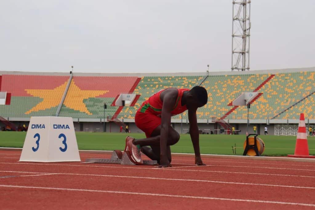 Athletes competing in a track and field event